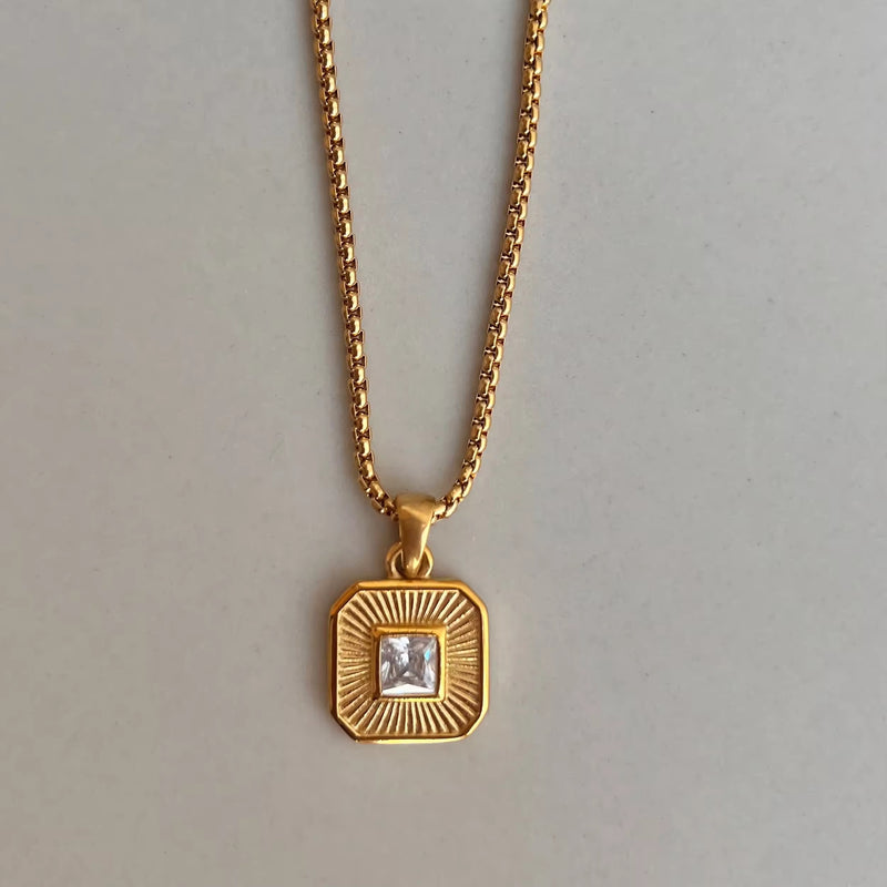 Modern radiant pendant necklace