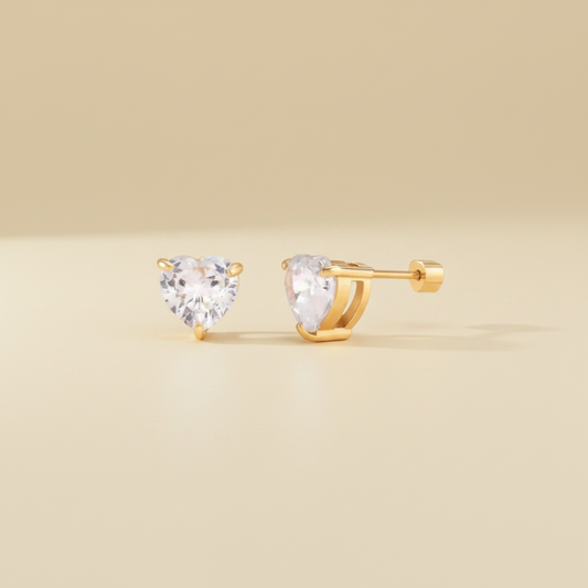 Elegant gold earrings with heart stones