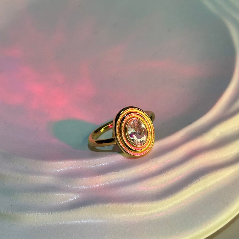 Elegant crystal halo gold ring